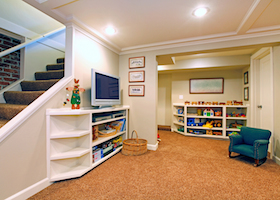Play room in a white basement living room